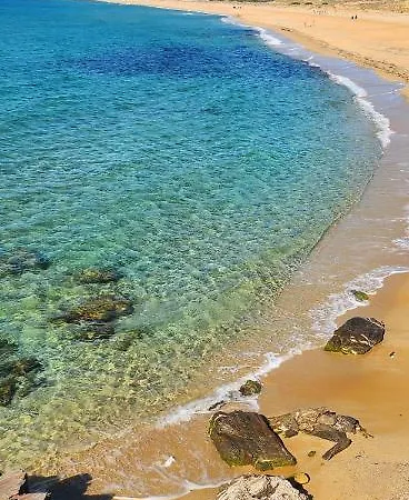 Апартаменты Oasi Del Relax - Seaside Peaceful Panoramic Terrace In Italy - New Sardinia 50 Mt Beach&sea Full Comfort Air Conditioning-wifi-parking-privacy